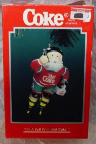 4530-1 € 10,00 coca cola ornament kerstman op schaatsen